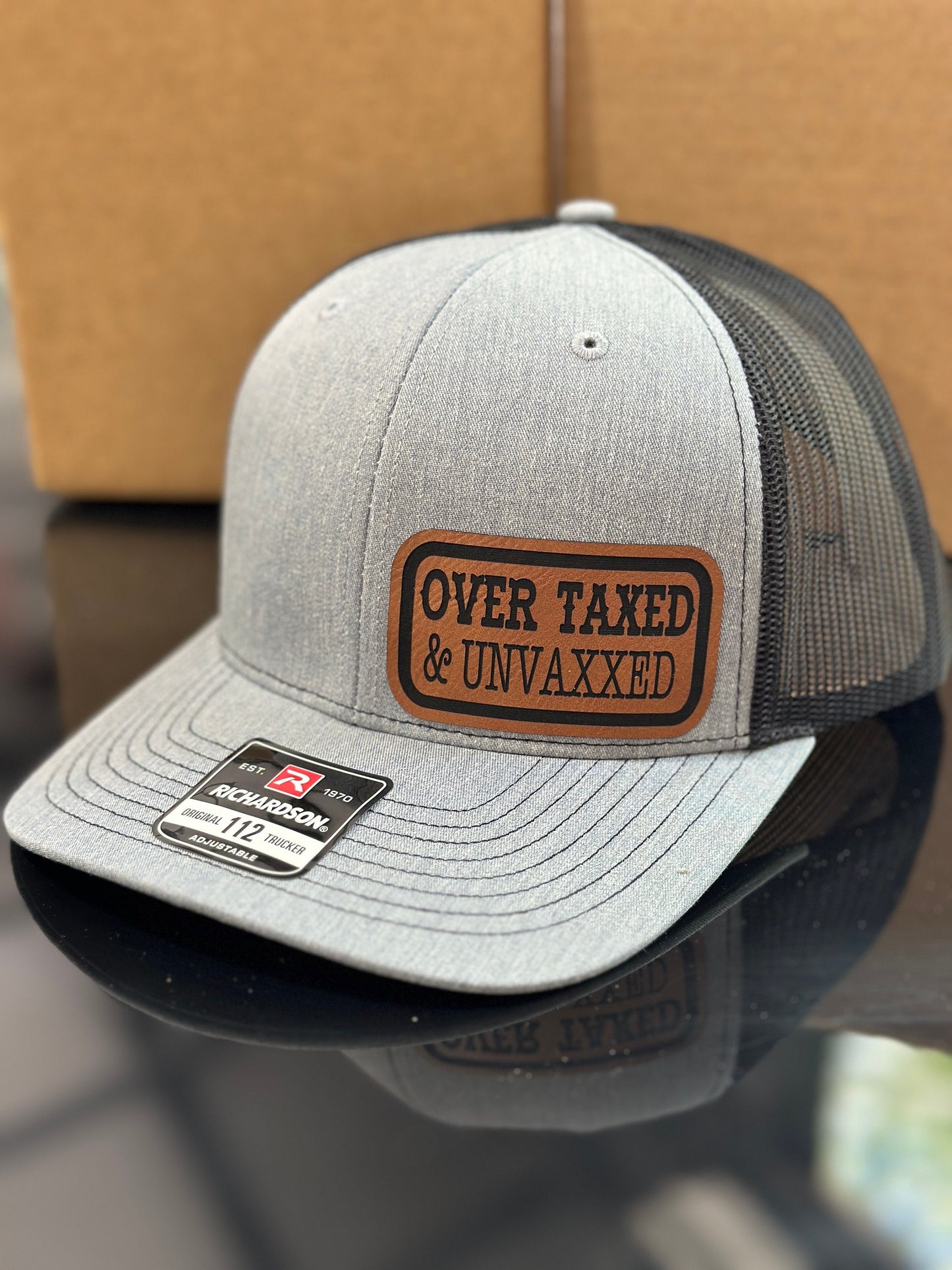 Over taxed, Unvaxxed, leatherette patch hat