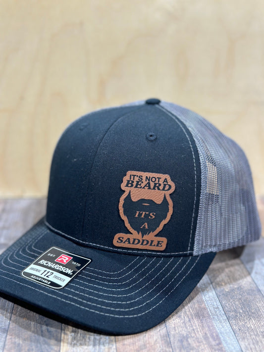 It’s not a beard, it’s a saddle , leatherette patch hat,
