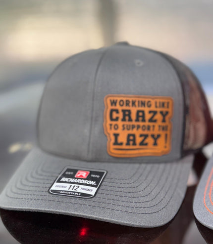 Working like crazy, to support the lazy, Hat