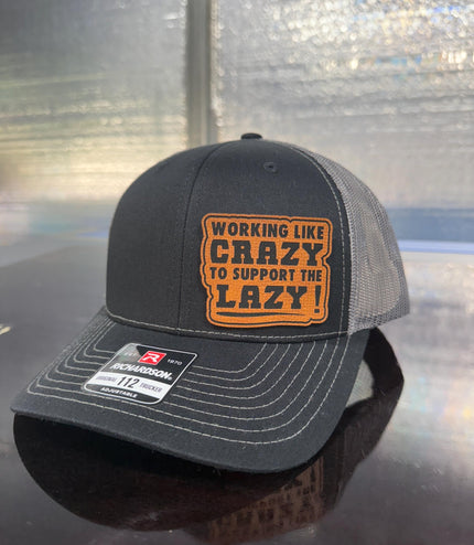 Working like crazy, to support the lazy, Hat