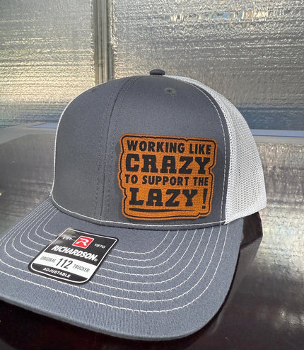 Working like crazy, to support the lazy, Hat